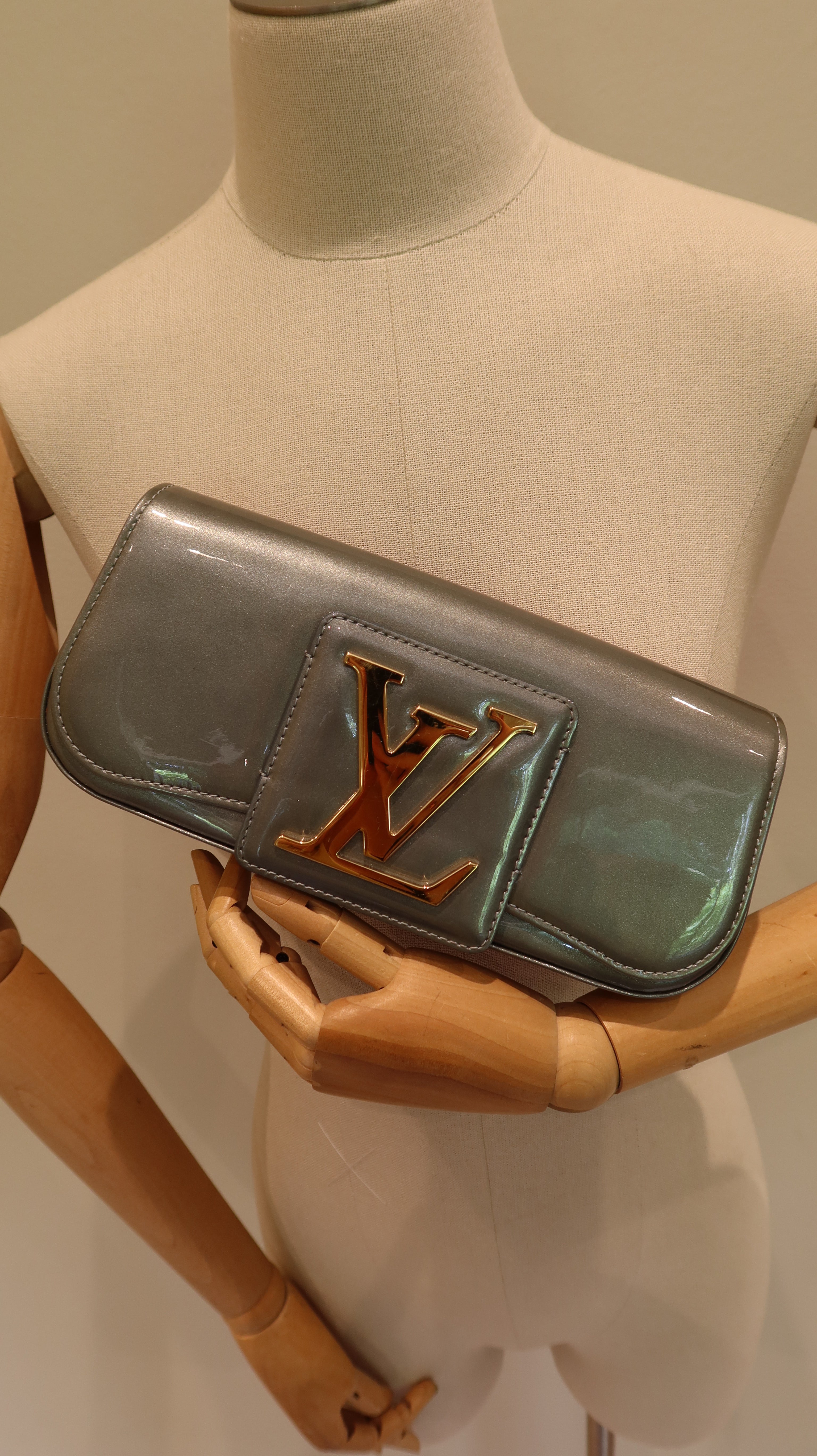 Louis Vuitton Sobe Clutch