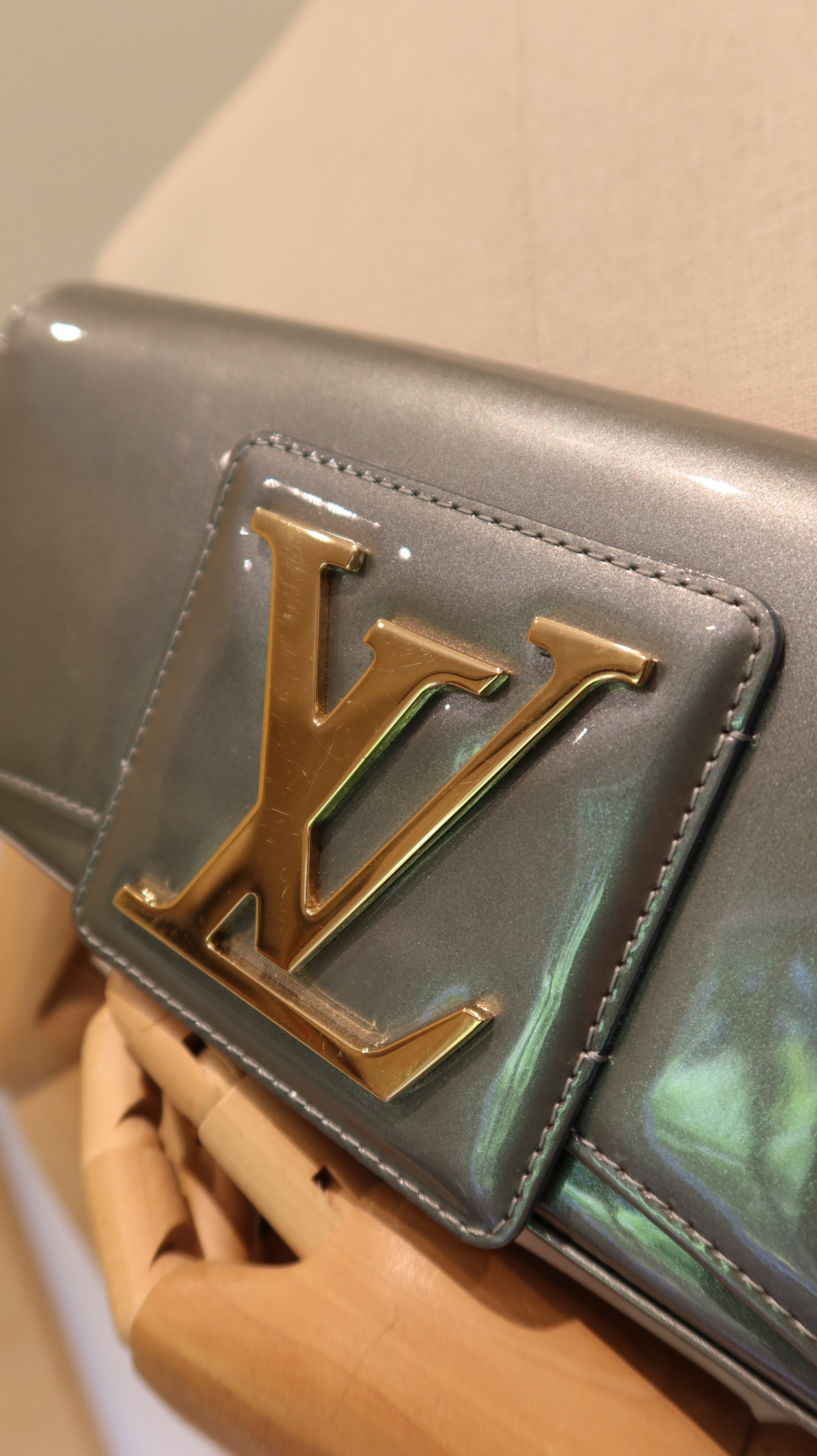 Louis Vuitton Sobe Clutch