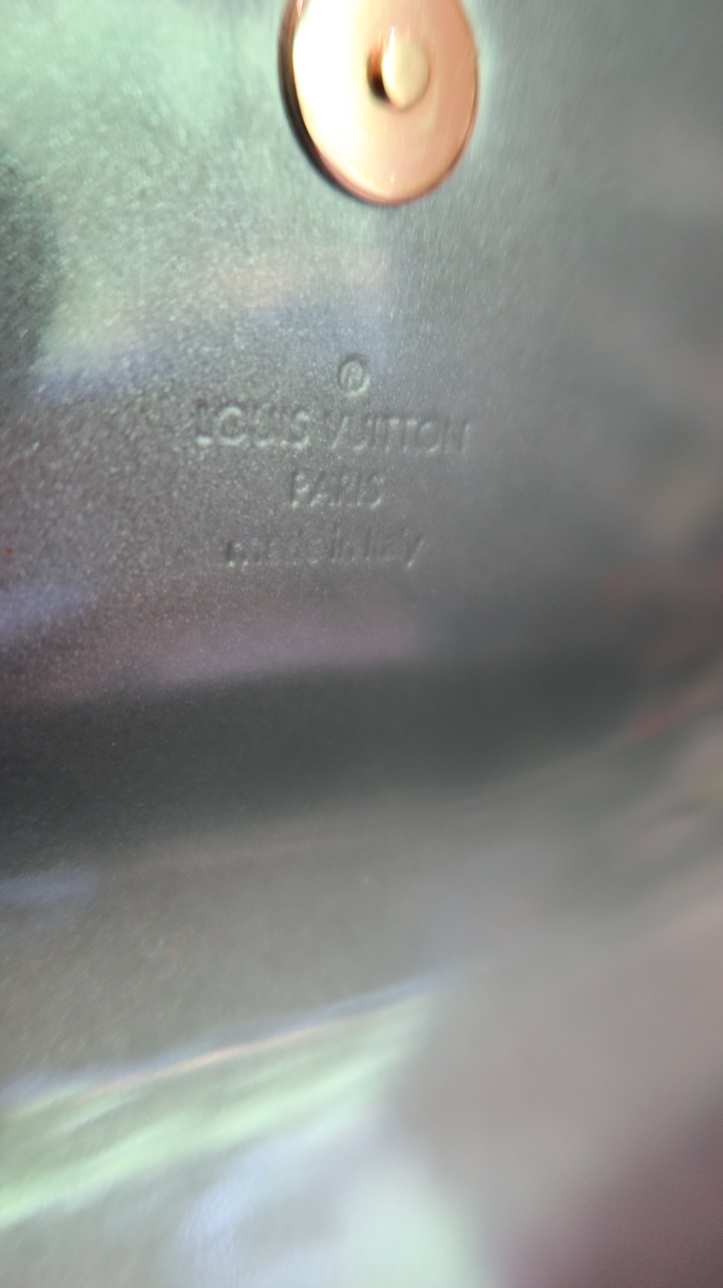 Louis Vuitton Sobe Clutch