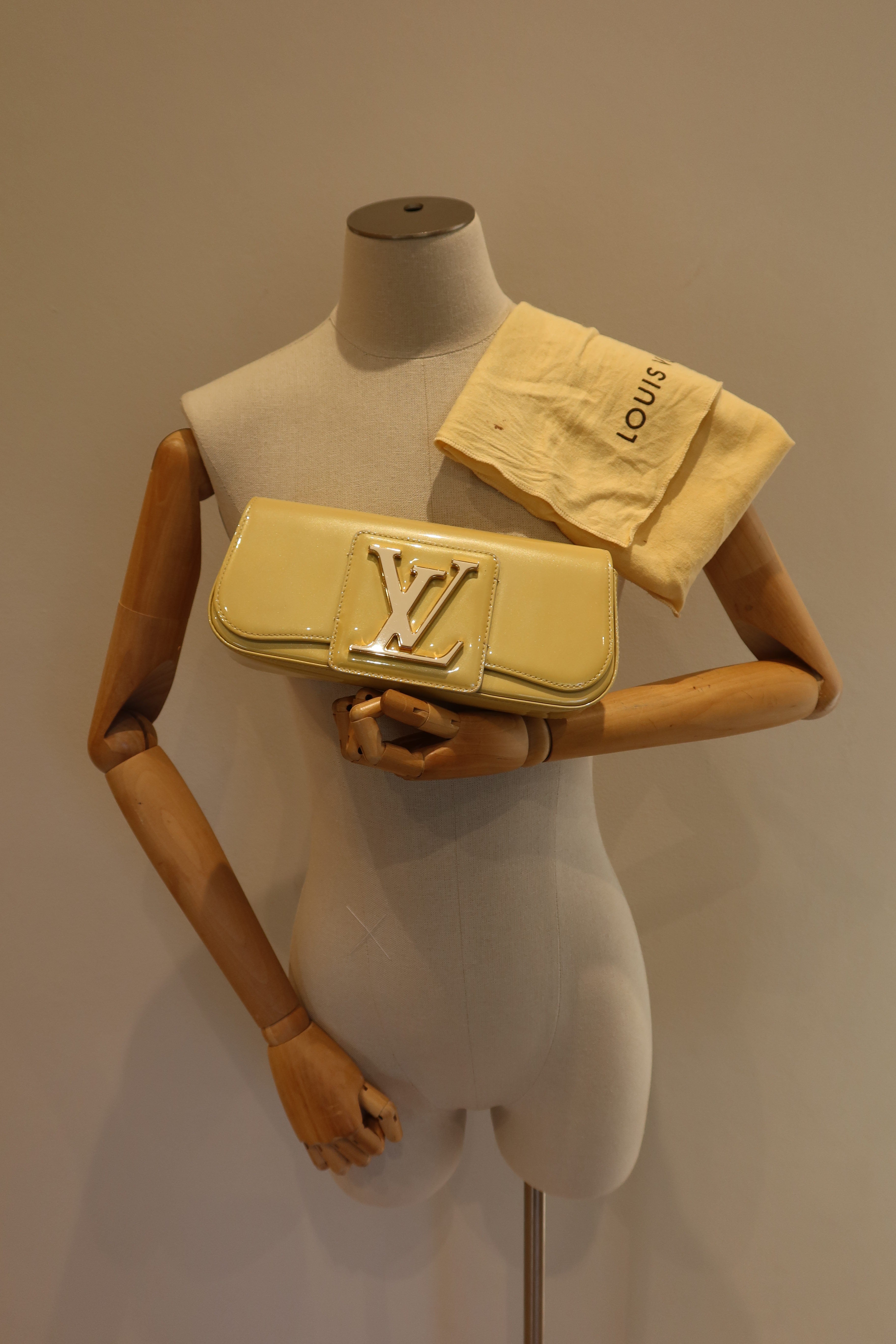 Louis Vuitton Sobe Clutch