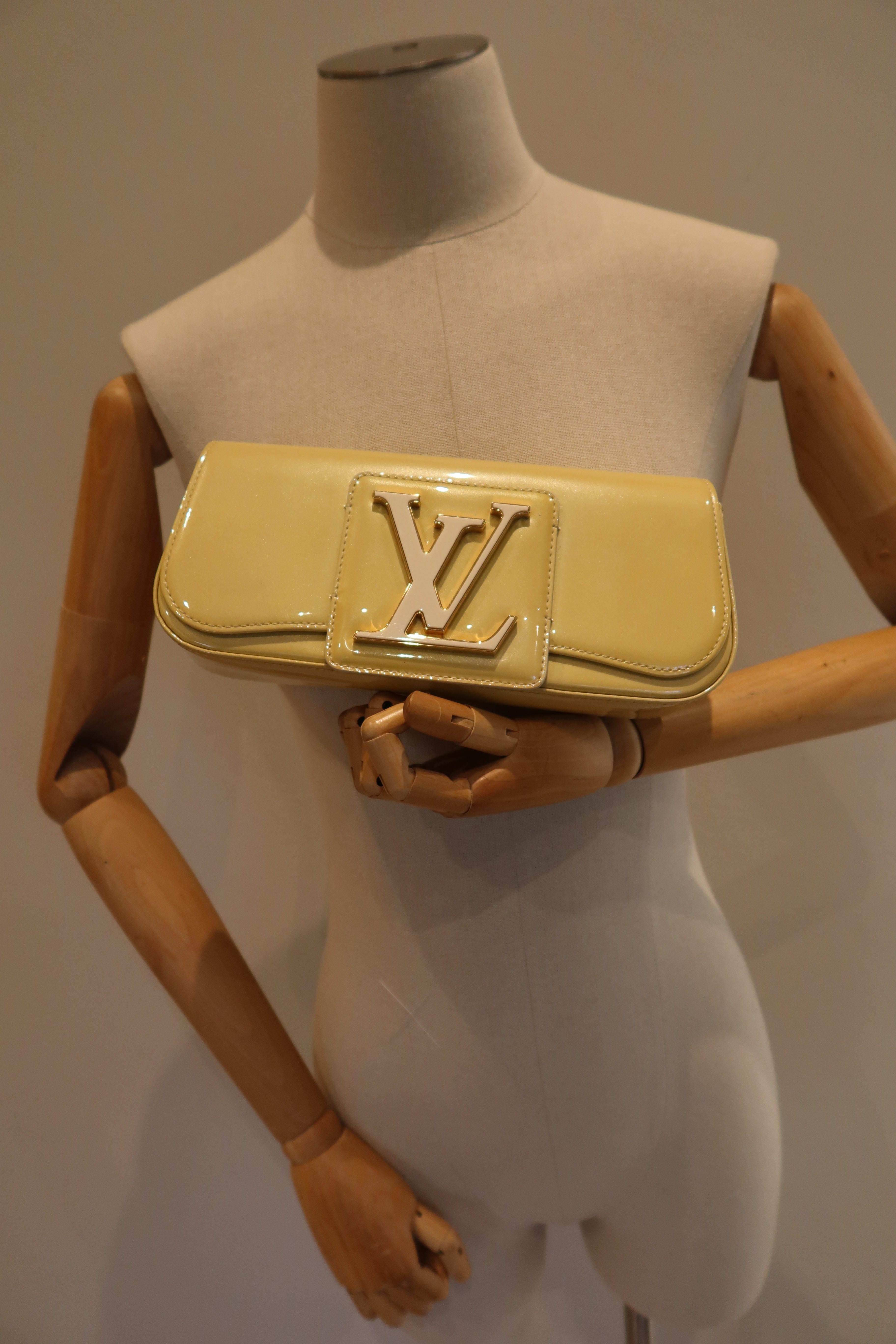 Louis Vuitton Sobe Clutch