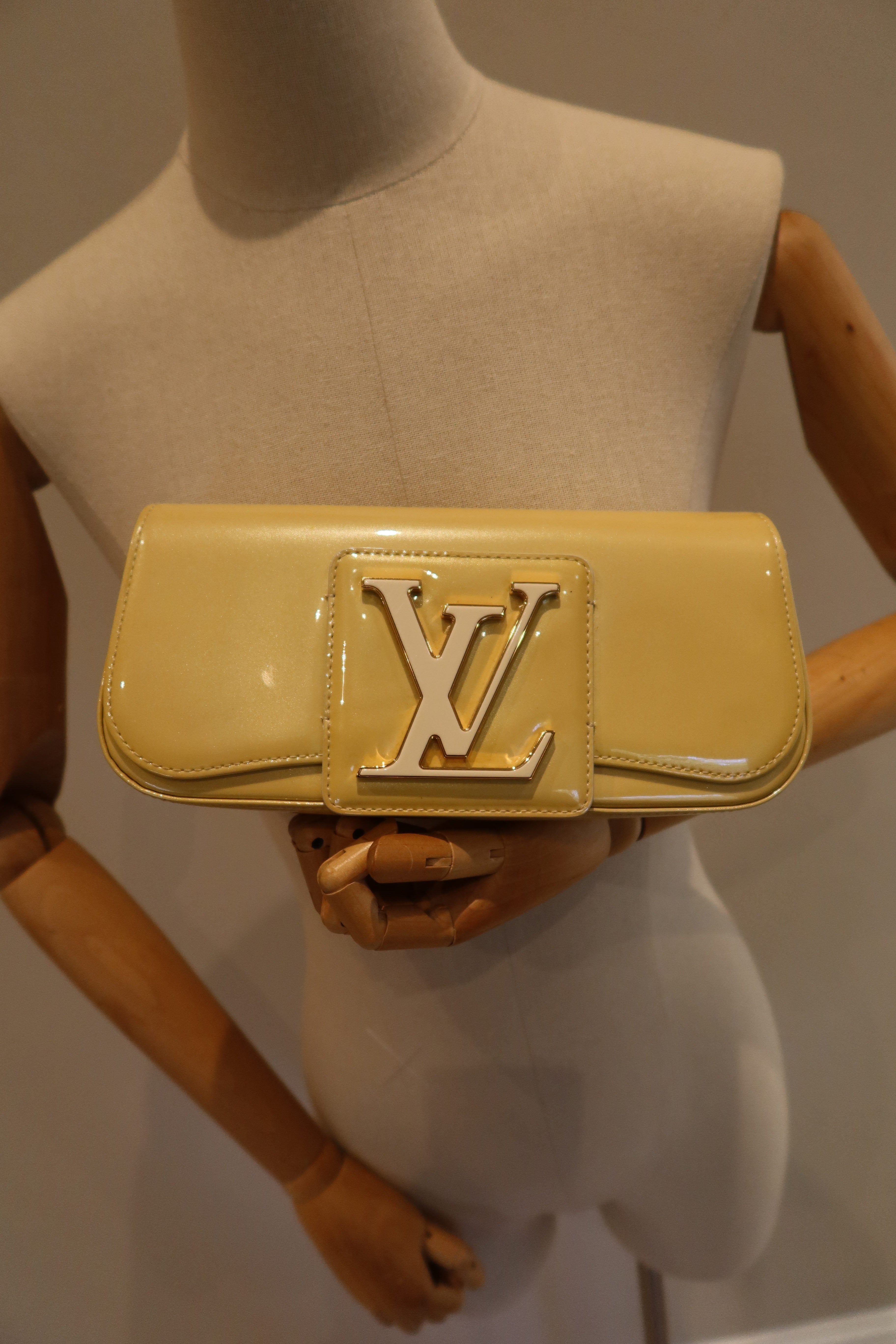 Louis Vuitton Sobe Clutch