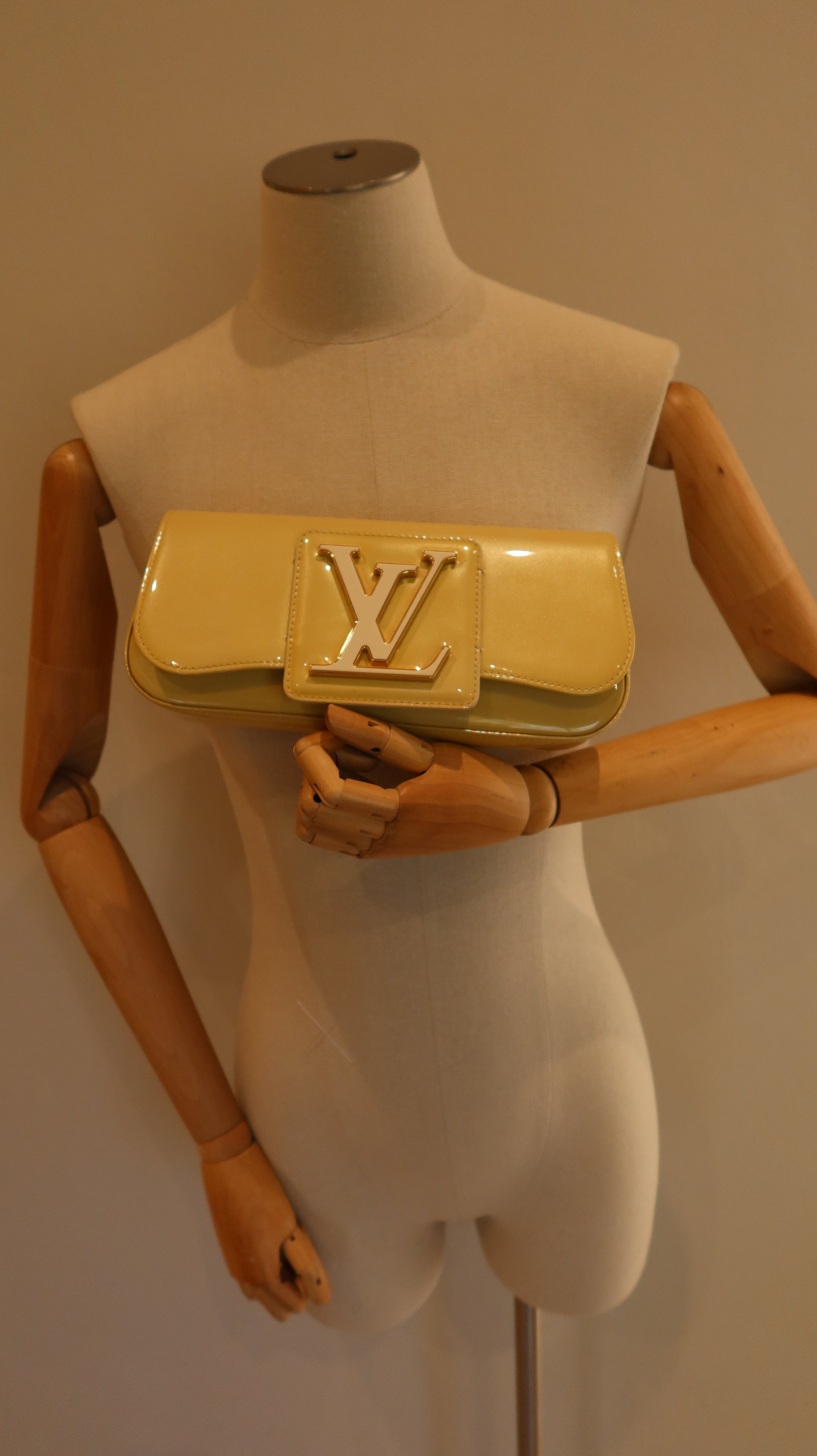 Louis Vuitton Sobe Clutch