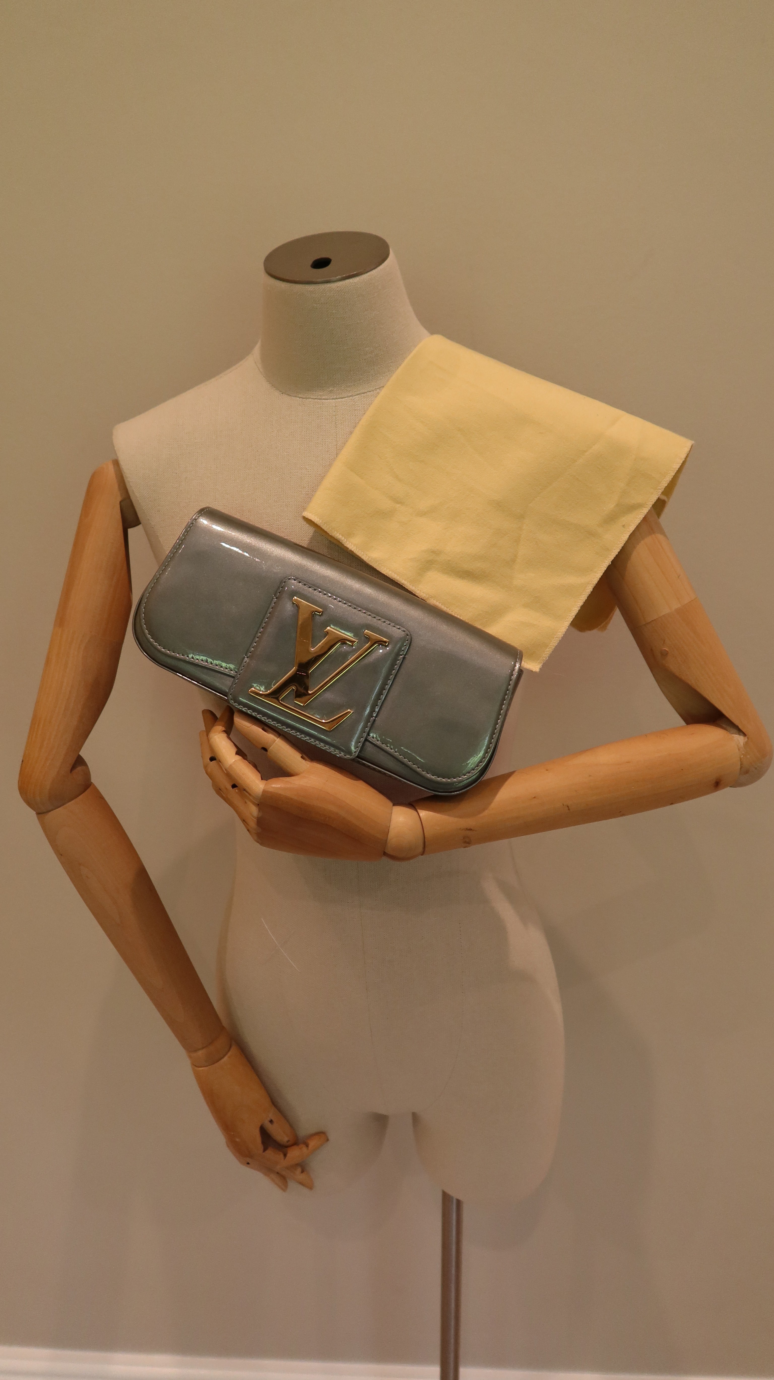 Louis Vuitton Sobe Clutch