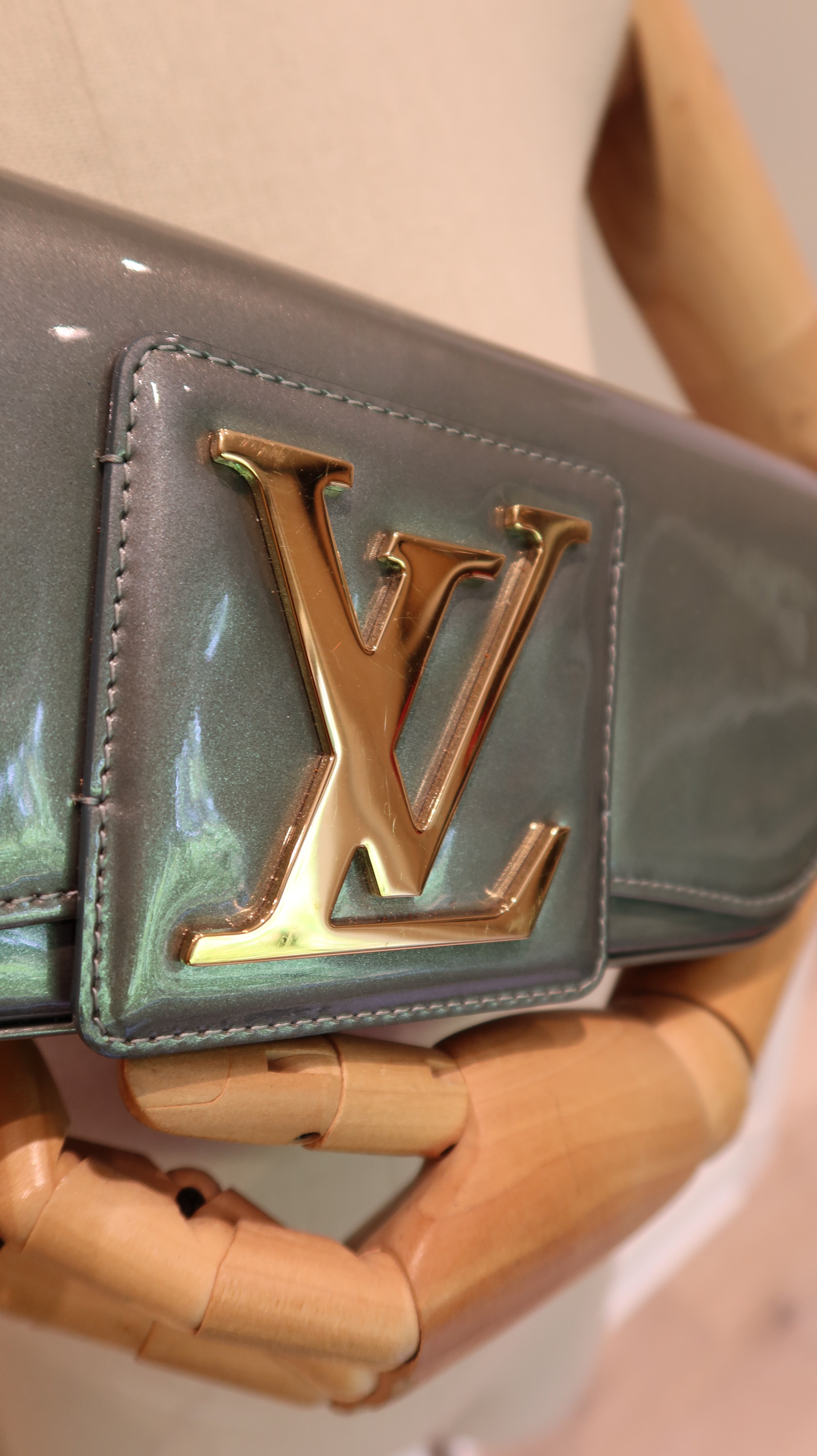 Louis Vuitton Sobe Clutch