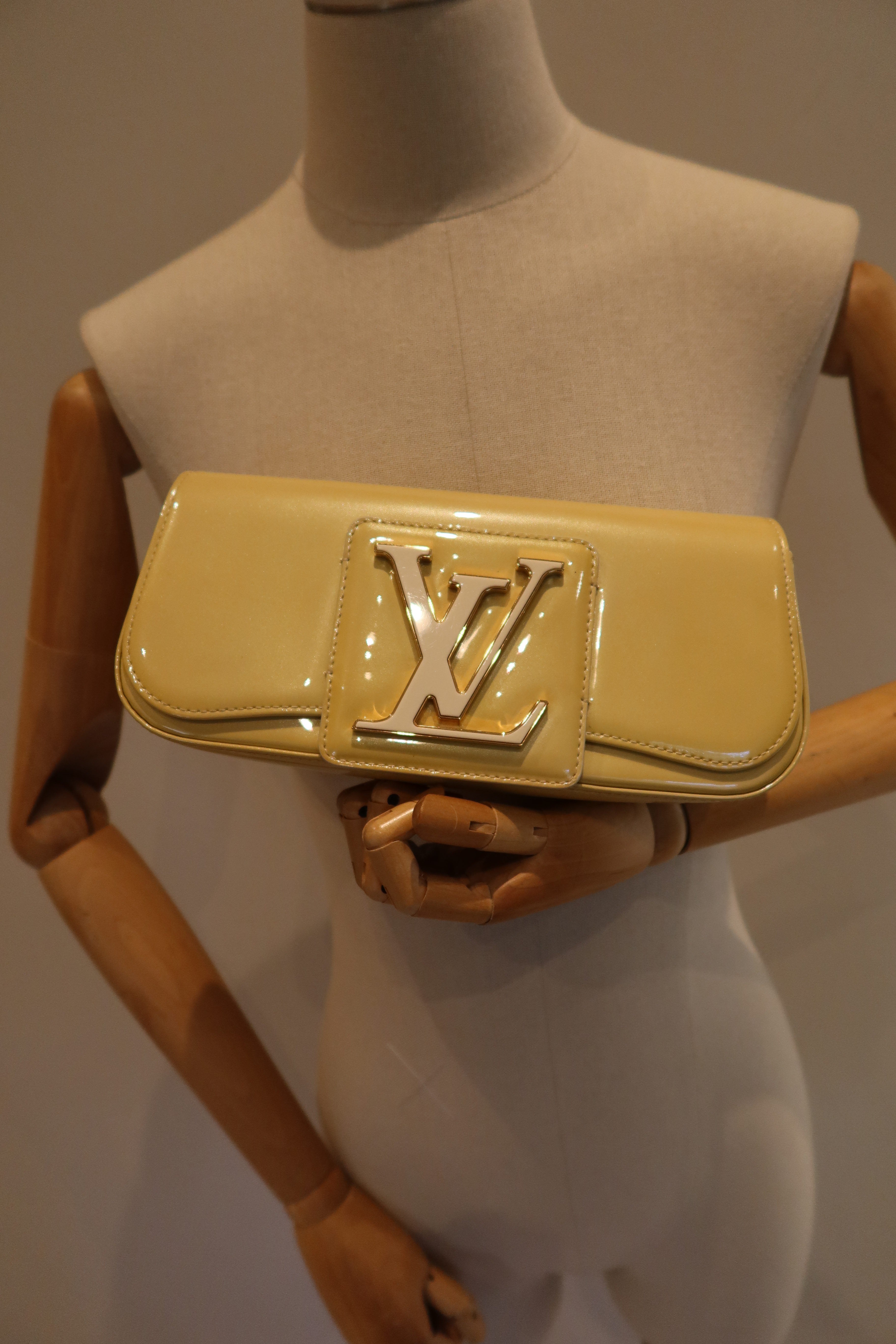 Louis Vuitton Sobe Clutch