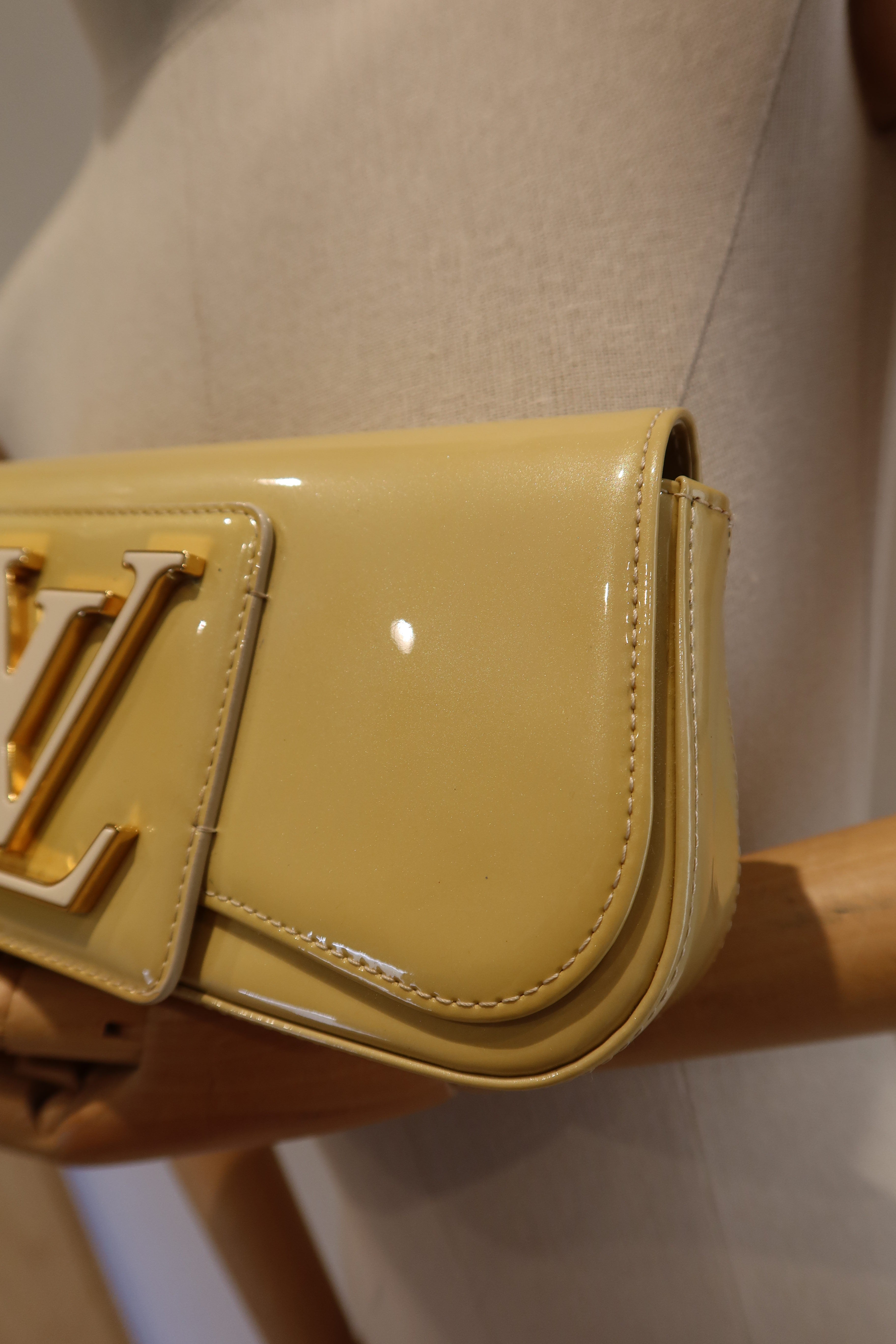 Louis Vuitton Sobe Clutch