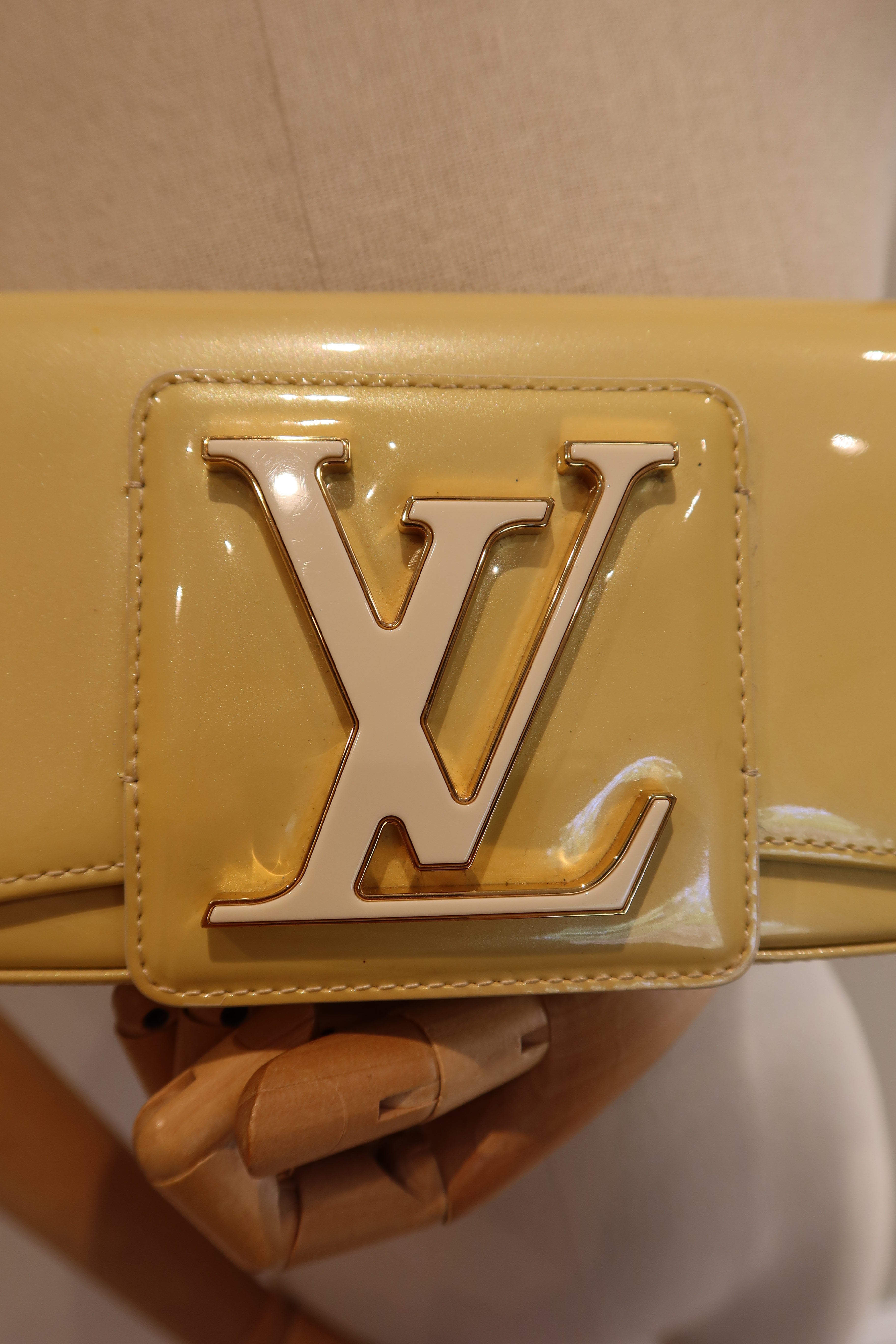 Louis Vuitton Sobe Clutch
