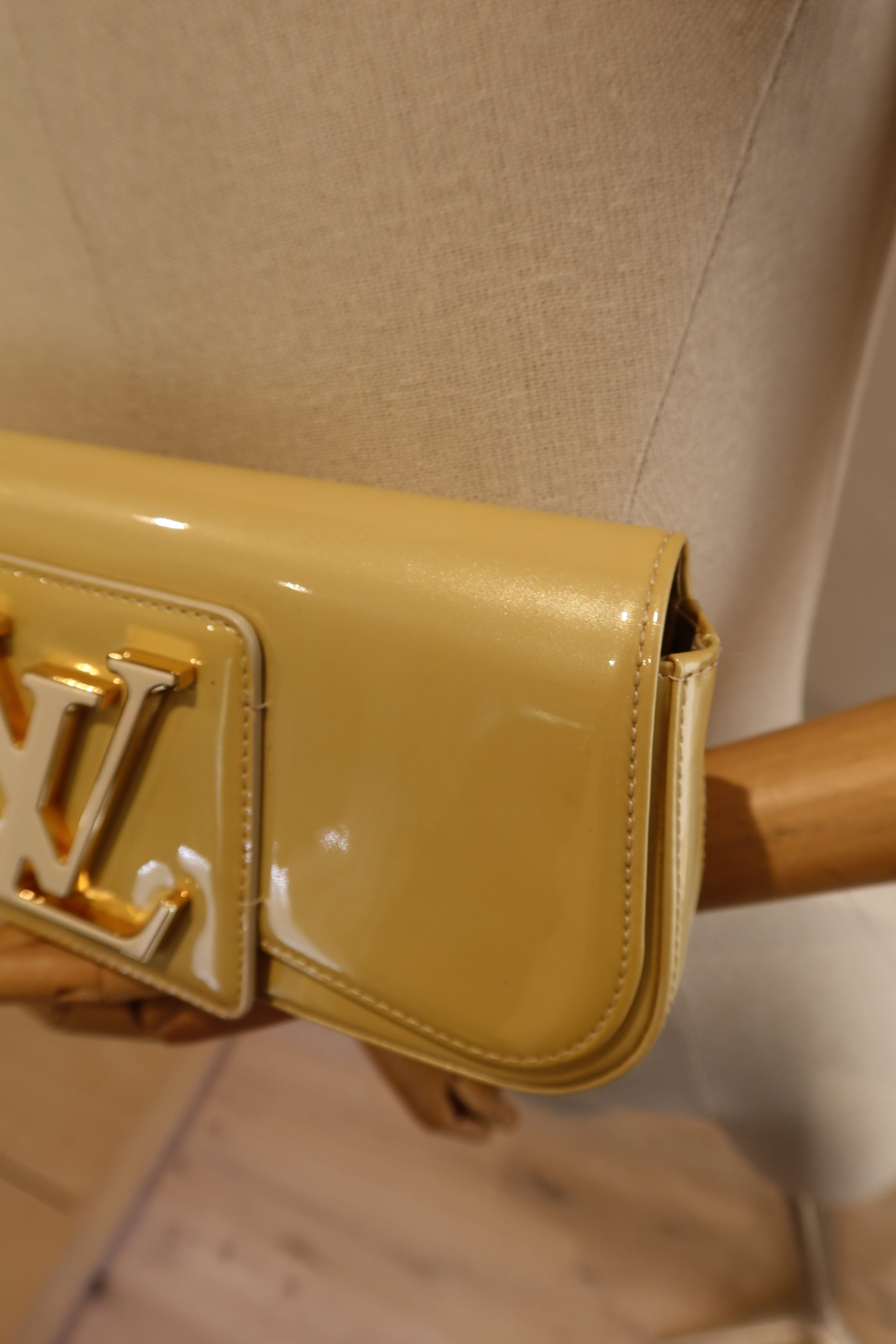 Louis Vuitton Sobe Clutch