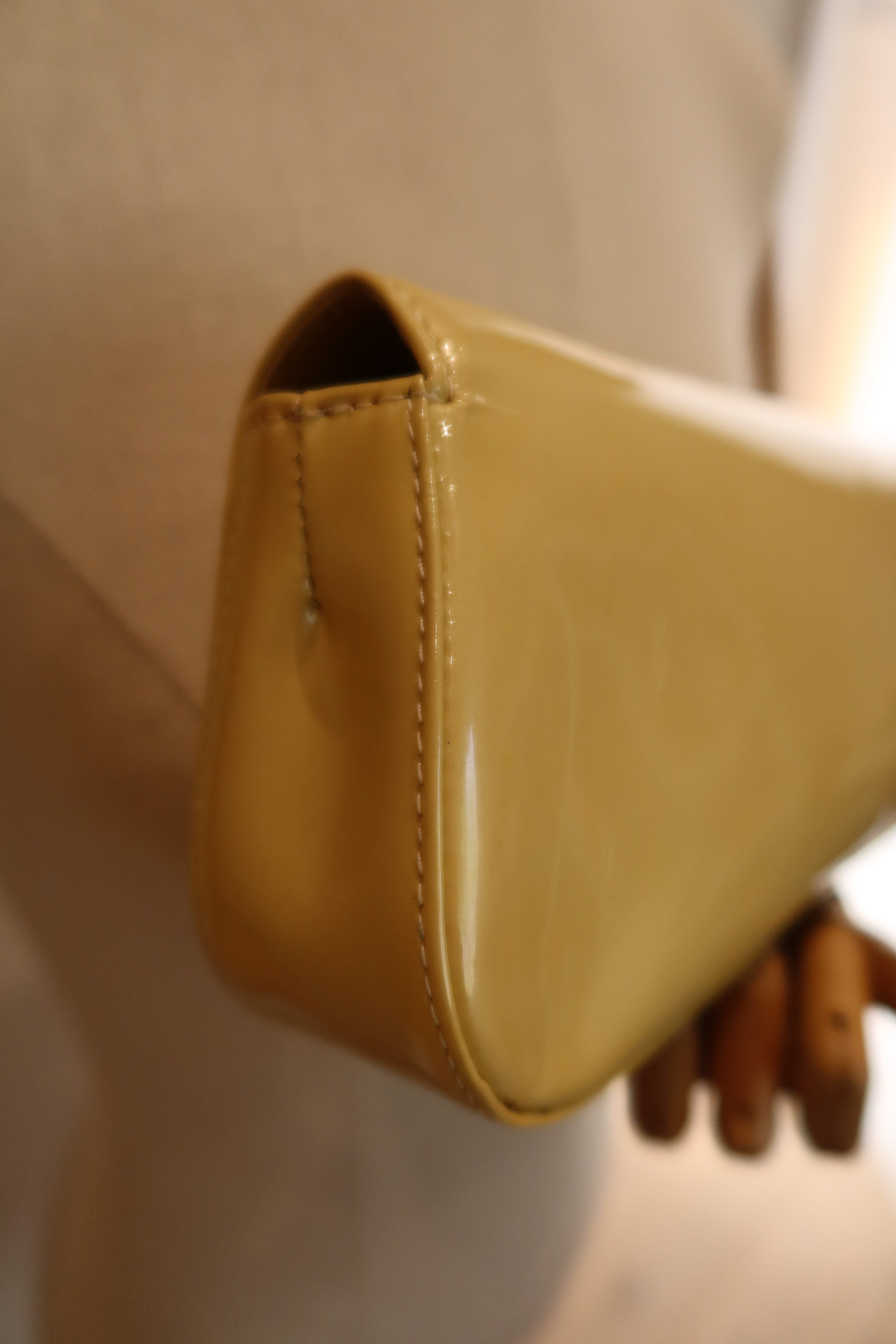 Louis Vuitton Sobe Clutch